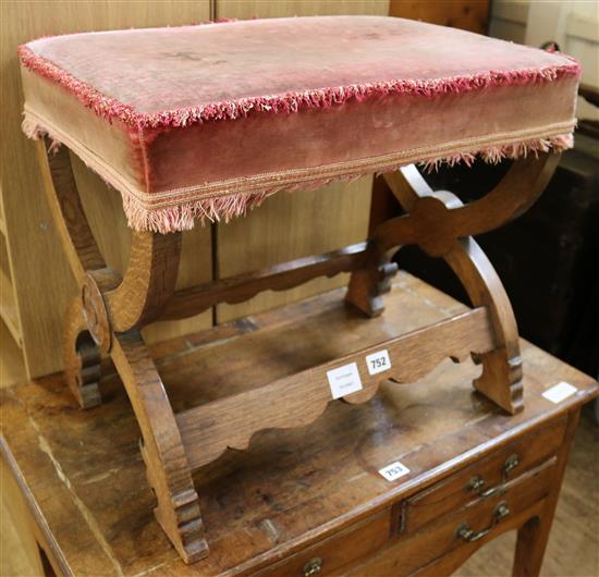 A Victorian mahogany X framed dressing stool